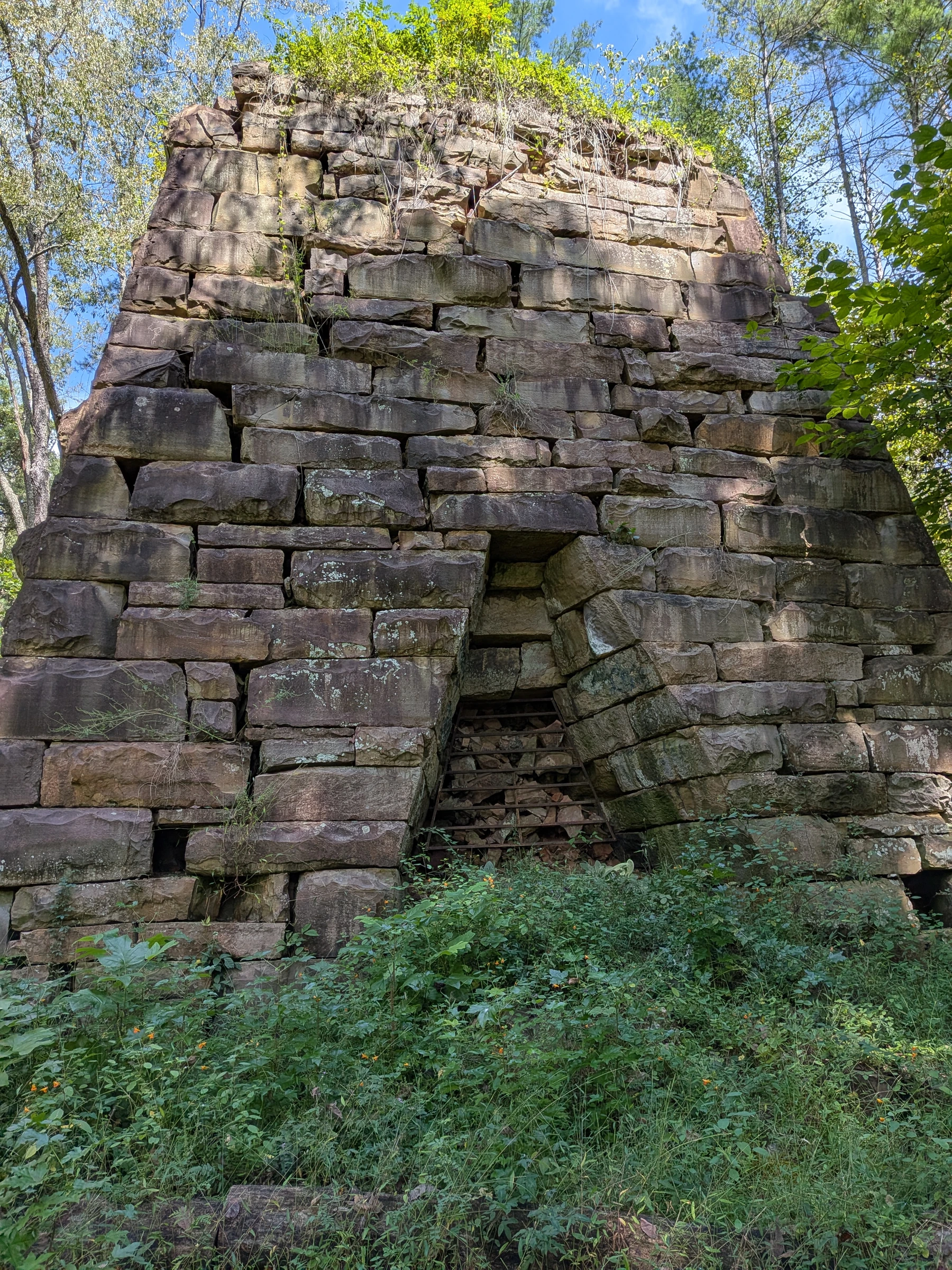 Charles Compton’s modern photograph of the surviving stone furnace